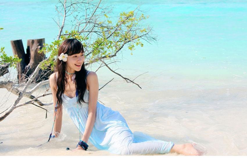 韩雪浪漫海滩写真清新淡妆宛如邻家女孩[4]